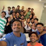 Our web design mentor and cheerful students posing for a lively selfie with thumbs up, enjoying class at the best digital marketing institute in Calicut
